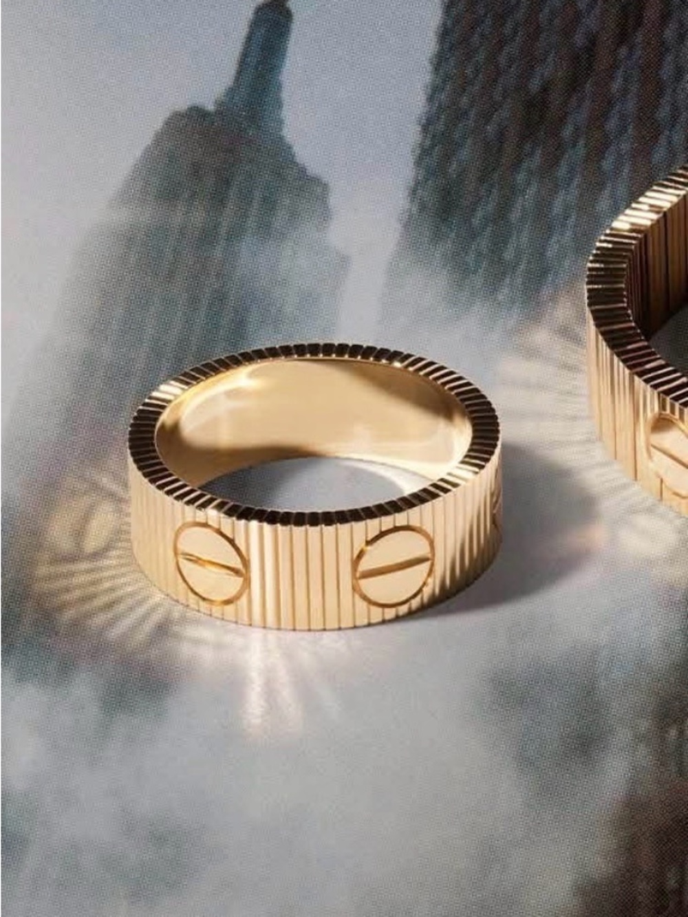 Ribbed Gold Band Ring with Screw Motif